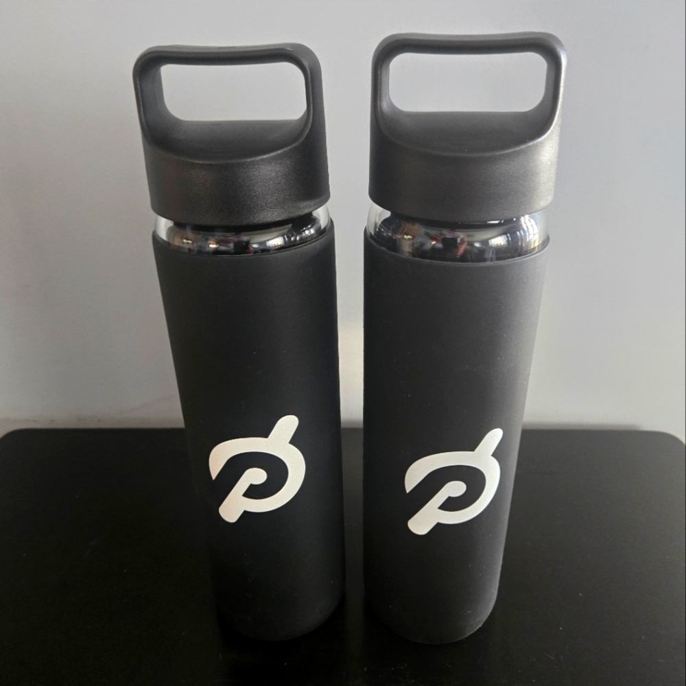 Set of 2 Peloton Glass Water Bottle w Soft Silicone Grip+ Lids